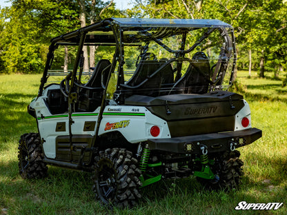 A black Kawasaki Teryx 4 cargo box attached to the rear of a white and green Kawasaki Teryx 4 UTV.